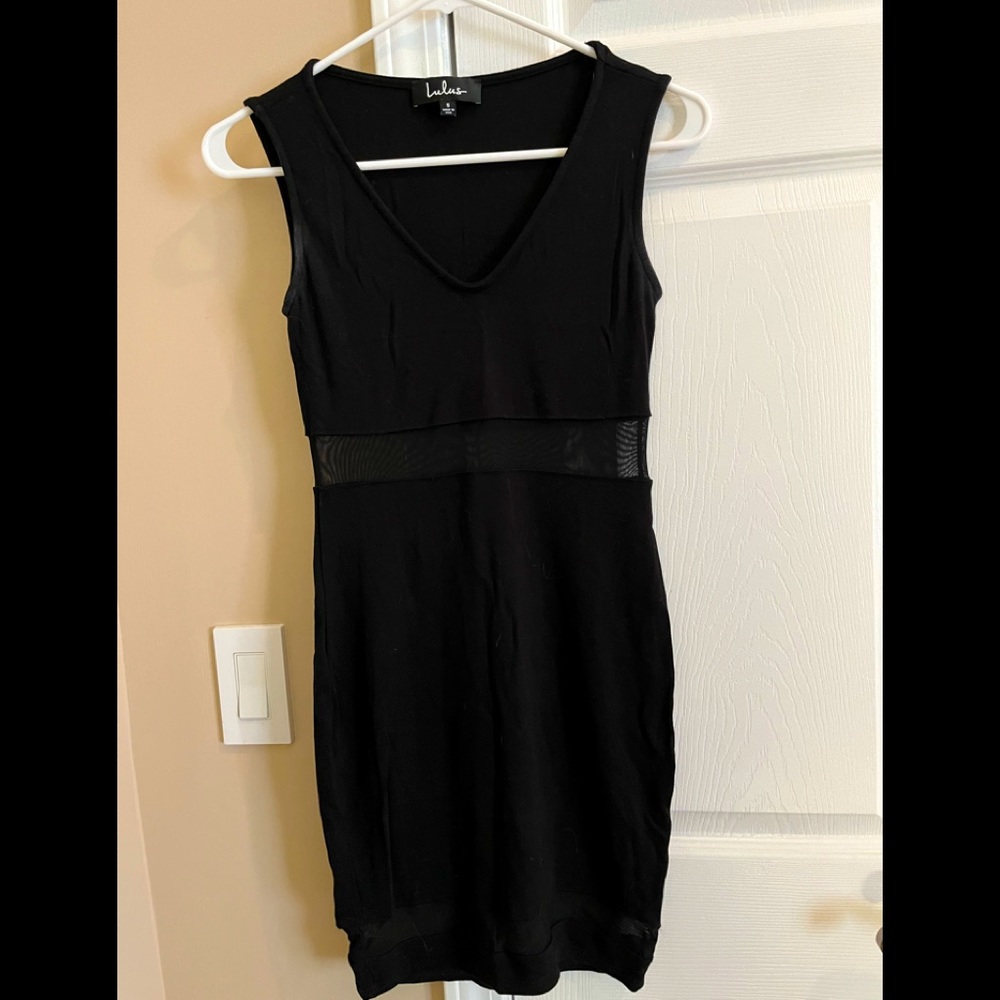 Black cocktail dress with mesh detailing